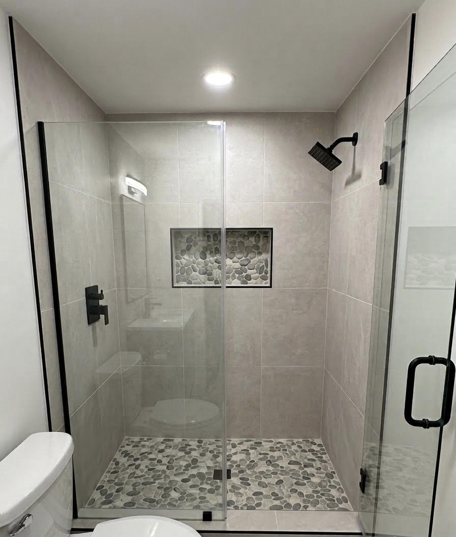 Custom bathroom remodel — tile shower and modern vanity